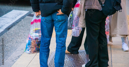 Tourists on Otaku Street in Japan's Electric Town photo