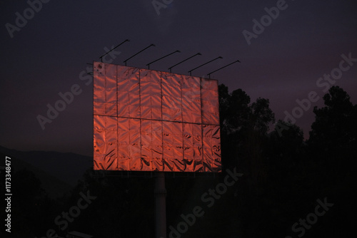 Blank roadside metal billboard at sunset, Chile photo