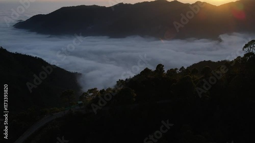 silhouette of a person in the mountains