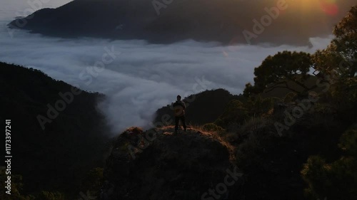 silhouette of a person in the mountains