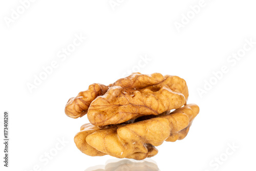 Shelled walnuts, close-up, isolated on a white background.