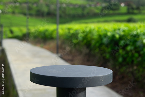 product stand with a background of Pangalengan tea plantation scenery, Indonesia