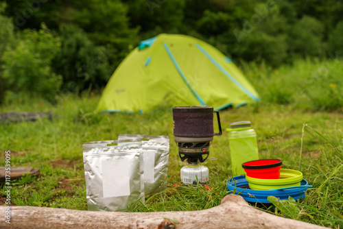 Cooking on a hike. Camping kitchen. Cooking freeze-dried food. Food in a camping camp. Kitchen and camping tent.