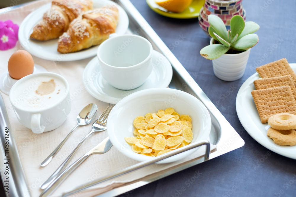 Continental breakfast coffee milk orange juice and croissant Continental breakfast coffee milk orange juice and croissant
