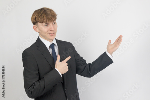 Teenage boy wearing a suit photo