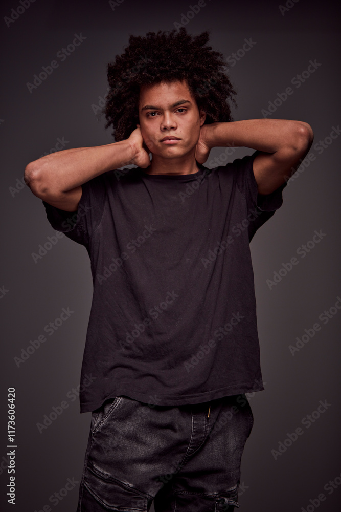 Studio Portrait of a young mixed race man. Studio Portrait of a young mixed race man.