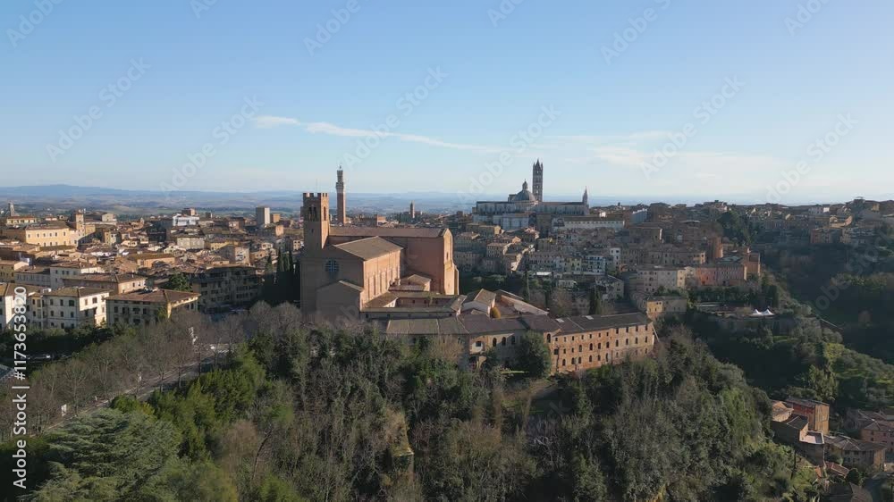 Aerial drone view of a cathedral in the old city center of Siena in Tuscany, Italy. Aerial drone view of a cathedral in the old city center of Siena in Tuscany, Italy.