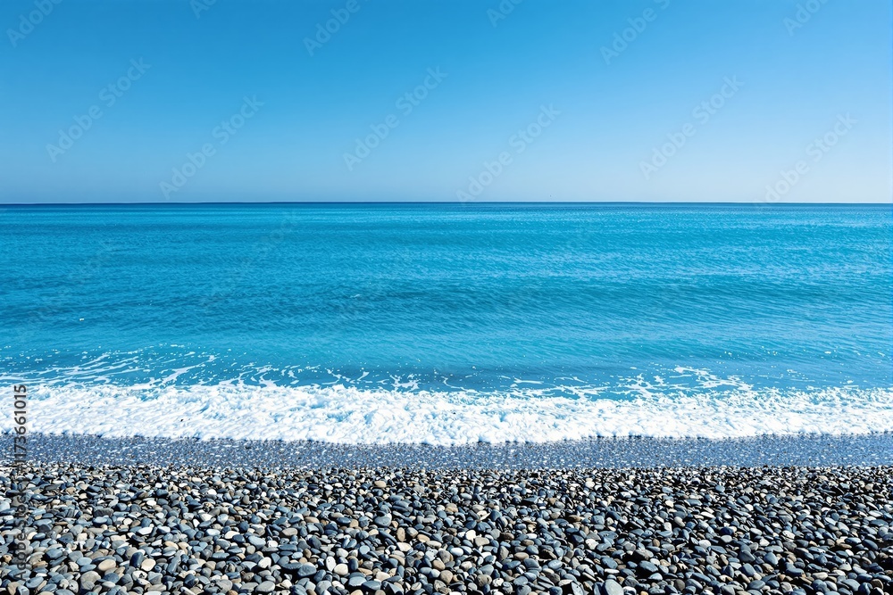Stunning blue ocean waves hitting a pebble beach under a clear blue sky. Stunning blue ocean waves hitting a pebble beach under a clear blue sky.