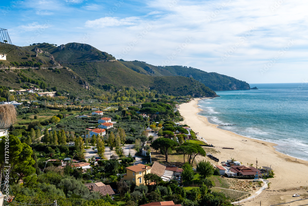 Naklejka premium Sandy beach of medieval small touristic coastal town Sperlonga and sea shore, Latina, Italy