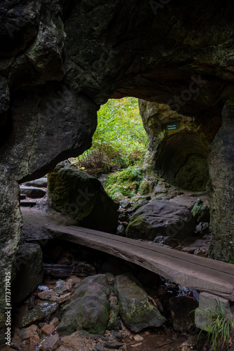 Scenic diversity of Mullerthal, Luxembourg's Little Switzerland, hiking routes, rock formations, moss-covered forests, tourist destination in Europe photo