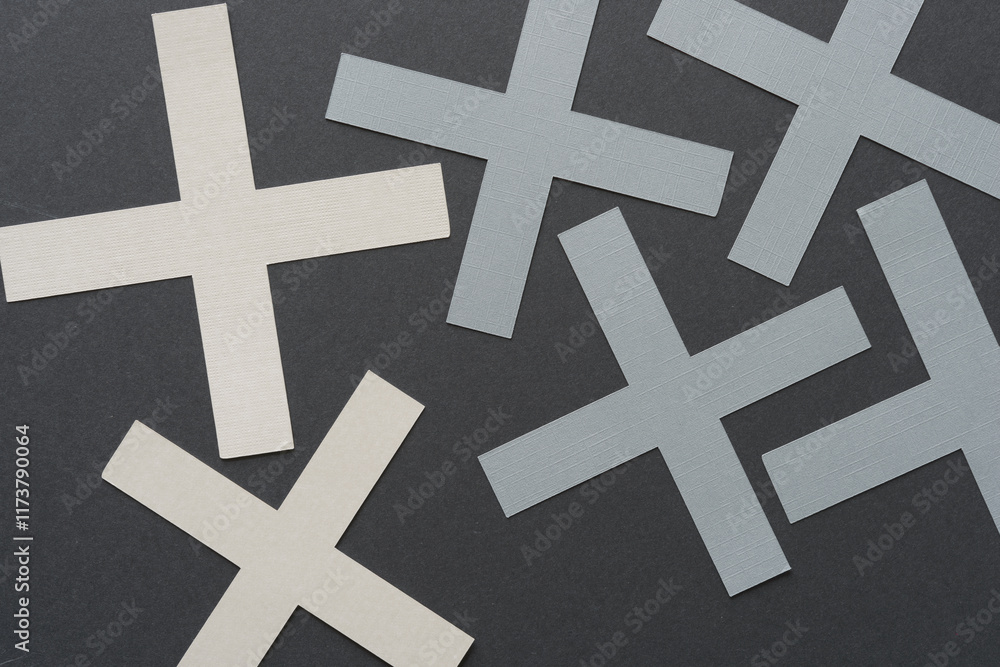 machine-cut cruciform geometric shapes on a relatively flat surface machine-cut cruciform geometric shapes on a relatively flat surface