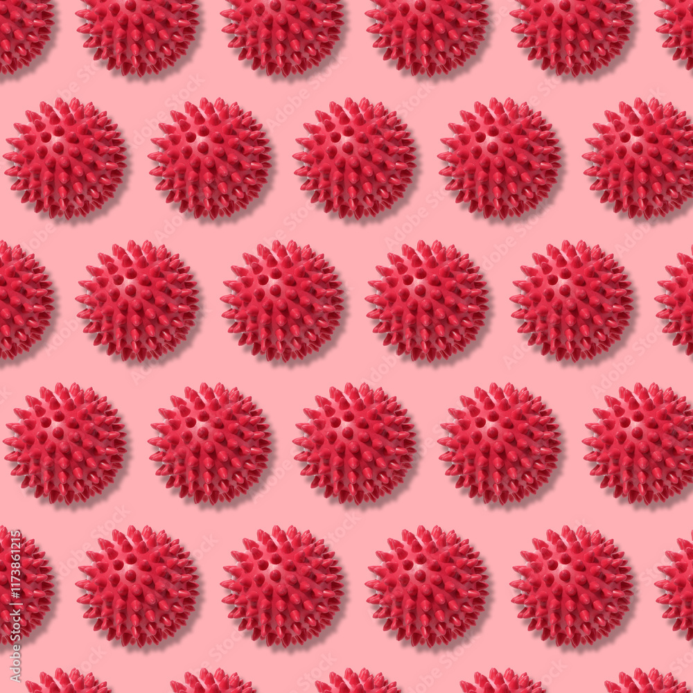 Round red ball with spikes, animal toy or massager. Repeating pattern Round red ball with spikes, animal toy or massager. Repeating pattern