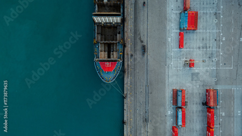 Aerial photography of containers for maritime transport of goods. Cargo ship in the port. Importation of products. Logistics park.