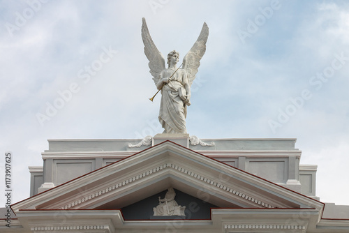 Obraz na płótnie Angel with a trumpet statue at the facade of the Cathedral Basilica of Our Lady of the Assumption in downtown Santiago de Cuba w salonie