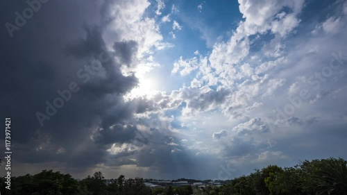 A 4K High Res timelapse of an impending storm sweeping over a suburban area during sunset, with dramatic clouds and golden light creating a striking contrast of nature and urban life.