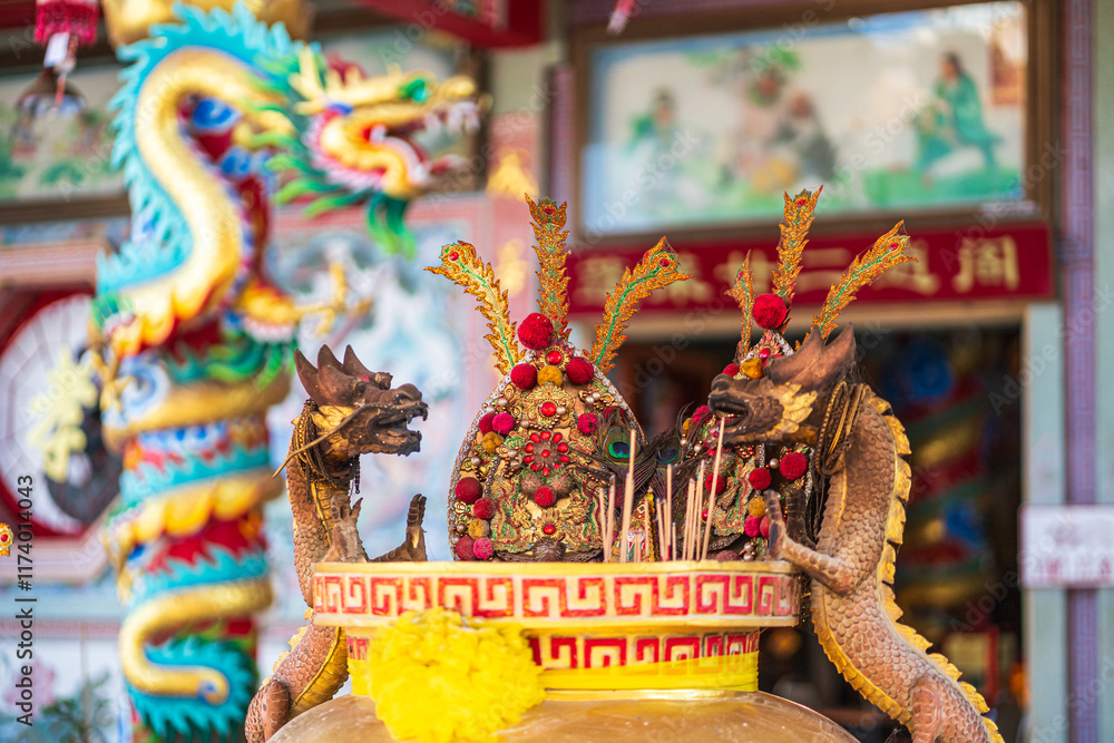 Red candles and burning incense sticks Paper gold with the Chinese alphabet Blessings written on it Is a Fortune blessing compliment for pay respect to god in Chinese New Year day at a Chinese shrine