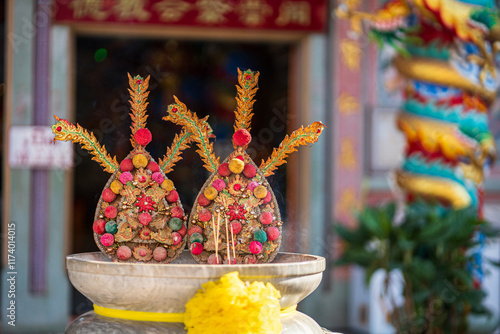 Obraz na płótnie Red candles and burning incense sticks Paper gold with the Chinese alphabet Blessings written on it Is a Fortune blessing compliment for pay respect to god in Chinese New Year day at a Chinese shrine w salonie