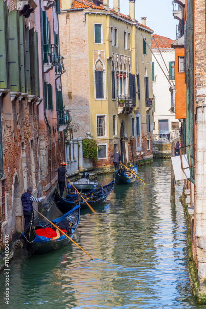 Obraz premium Italy, Venice. Gondolas in a small canal.