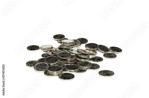 Pile of assorted coins scattered on a white background for financial themes photo