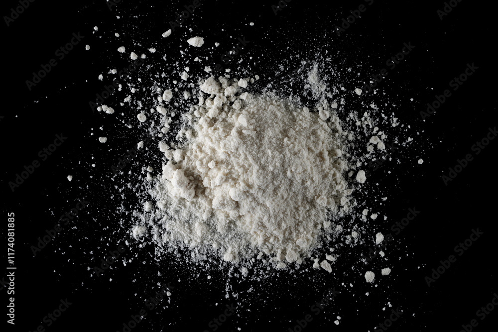 Organic coconut flour isolated on black, top view, clipping Organic coconut flour isolated on black, top view, clipping