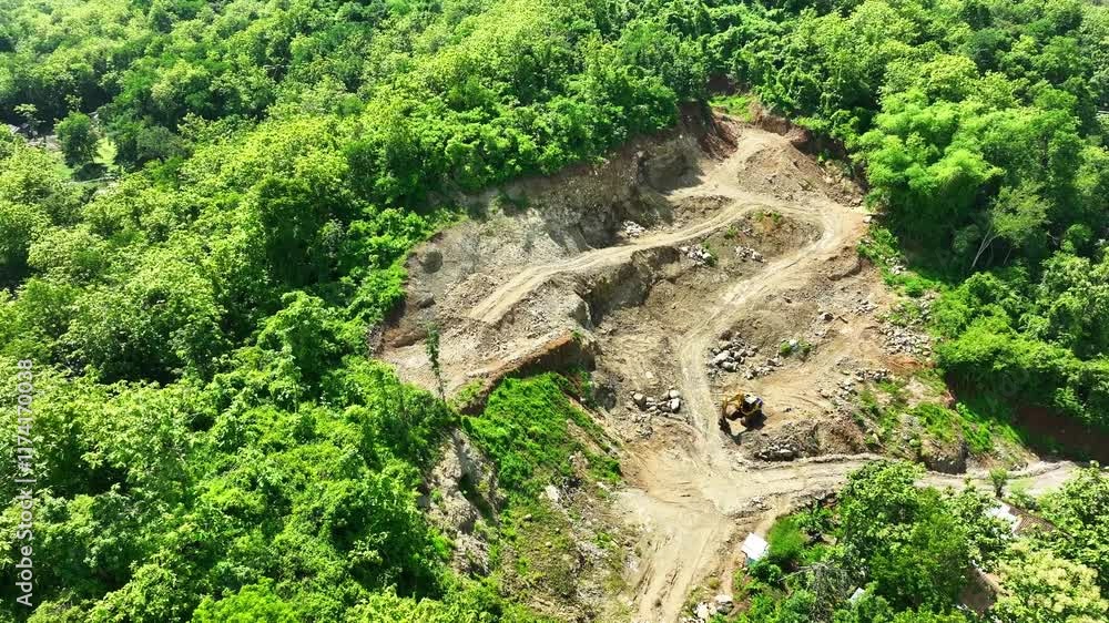 Aerial View of a Quarry Amidst Lush Green Foliage in a Tropical Setting Aerial View of a Quarry Amidst Lush Green Foliage in a Tropical Setting