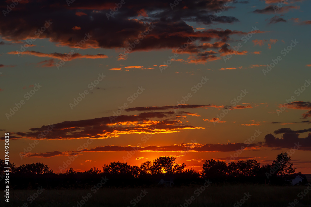 Fototapeta premium An golden-red Iowa sunset.