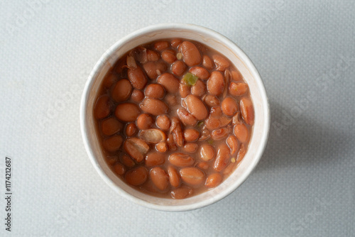 Konstfotografi A top down view of a cup of pinto beans.