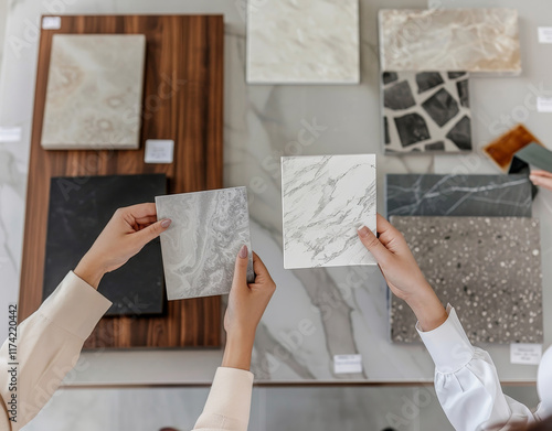 Wallpaper Mural Two women are presenting various stone samples while engaging in material selection at a design showroom during the daytime Torontodigital.ca