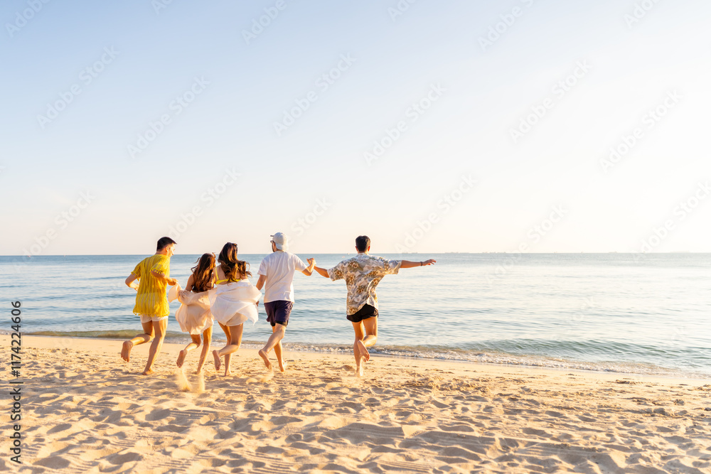 Happy man and woman travel the sea on summer beach holiday vacation. Group of Asian people friends enjoy and fun outdoor lifestyle travel nature running and playing together at tropical island beach. Happy man and woman travel the sea on summer beach holiday vacation. Group of Asian people friends enjoy and fun outdoor lifestyle travel nature running and playing together at tropical island beach.
