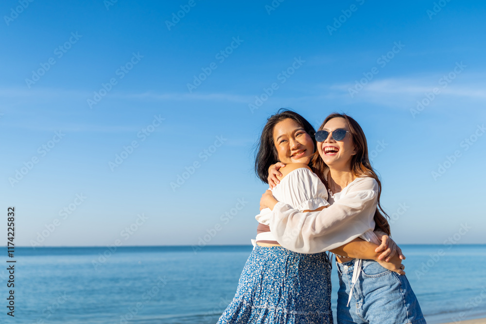 Happy woman travel nature ocean on summer beach holiday vacation. Portrait of Asian women friends enjoy and fun outdoor lifestyle hugging and playing during travel tropical island beach in sunny day. Happy woman travel nature ocean on summer beach holiday vacation. Portrait of Asian women friends enjoy and fun outdoor lifestyle hugging and playing during travel tropical island beach in sunny day.