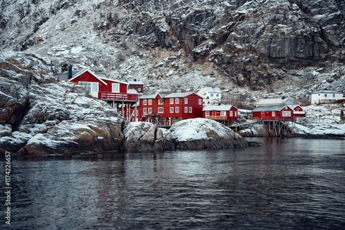 Charming and picturesque Winter Landscape featuring vibrant Red Cabins set in beautiful Norway