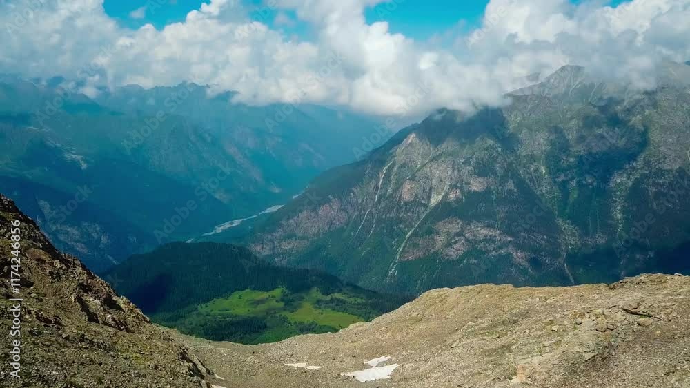 Aerial drone view of mountain landscape glaciers and valley on a sunny day. Dombay, North Caucasus, Karachay-Cherkessia. High quality 4k footage Aerial drone view of mountain landscape glaciers and valley on a sunny day. Dombay, North Caucasus, Karachay-Cherkessia. High quality 4k footage