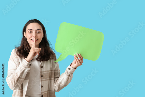 Young woman with blank spee...