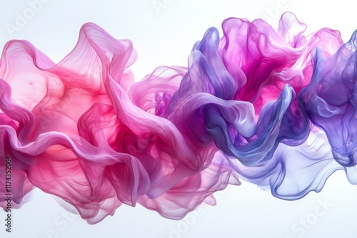 Abstract pink and purple ink swirls merging in water