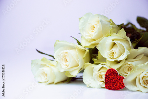 A glittery red heart lies atop elegant white roses, symbolizing love and purity. A perfect representation of romance, passion, and beauty for Valentine's Day