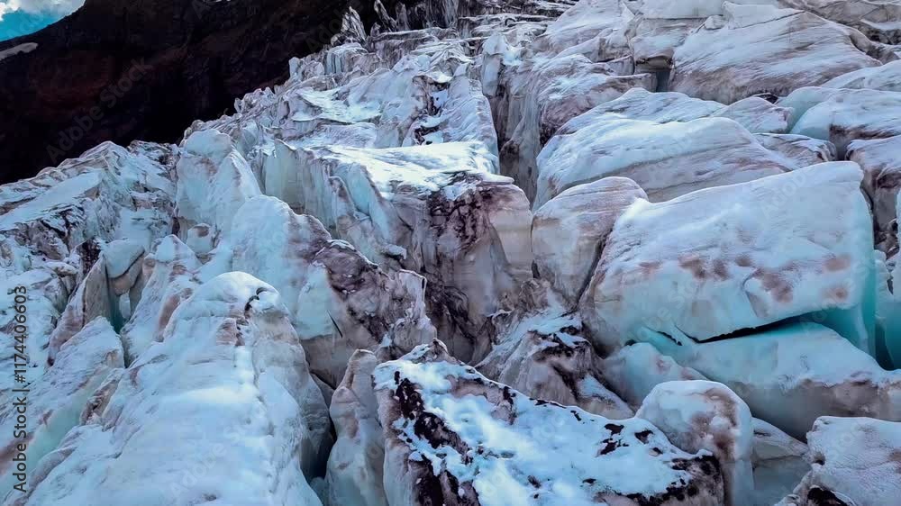 Aerial drone view of the glacier and snow-capped mountain peaks. Elbrus, North Caucasus, Karachay-Cherkessia. High quality 4k footage Aerial drone view of the glacier and snow-capped mountain peaks. Elbrus, North Caucasus, Karachay-Cherkessia. High quality 4k footage