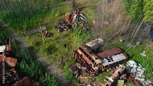 Drone footage of Rusted vehicles in Rozsokha Vehicle settler, chernobyl Exclusion Zone of Ukraine. 
