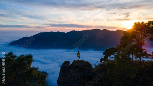 silhouette of a person in the mountains
