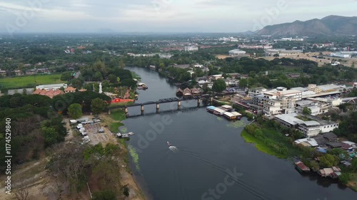 Aerial photograph (drone) of a train passing through the famous Death Railway in Kanchanaburi, Thailand