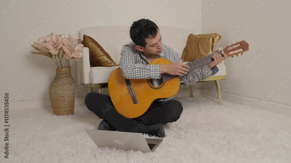 person playing guitar