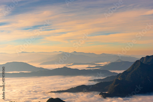 Obraz na płótnie Landscape and sun rise of the mountain and sea of mist in winter sunrise view from top of Phu Chi Dao mountain , Chiang Rai, Thailand w salonie