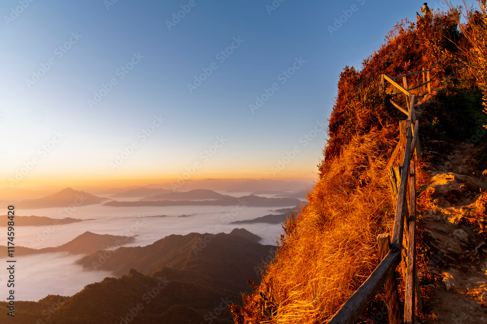 Landscape and sun rise of the mountain and sea of mist in winter sunrise view from top of Phu Chi Dao mountain , Chiang Rai, Thailand
