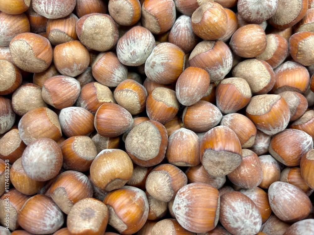 Closeup on bulk bin of hazelnuts at grocery store Closeup on bulk bin of hazelnuts at grocery store