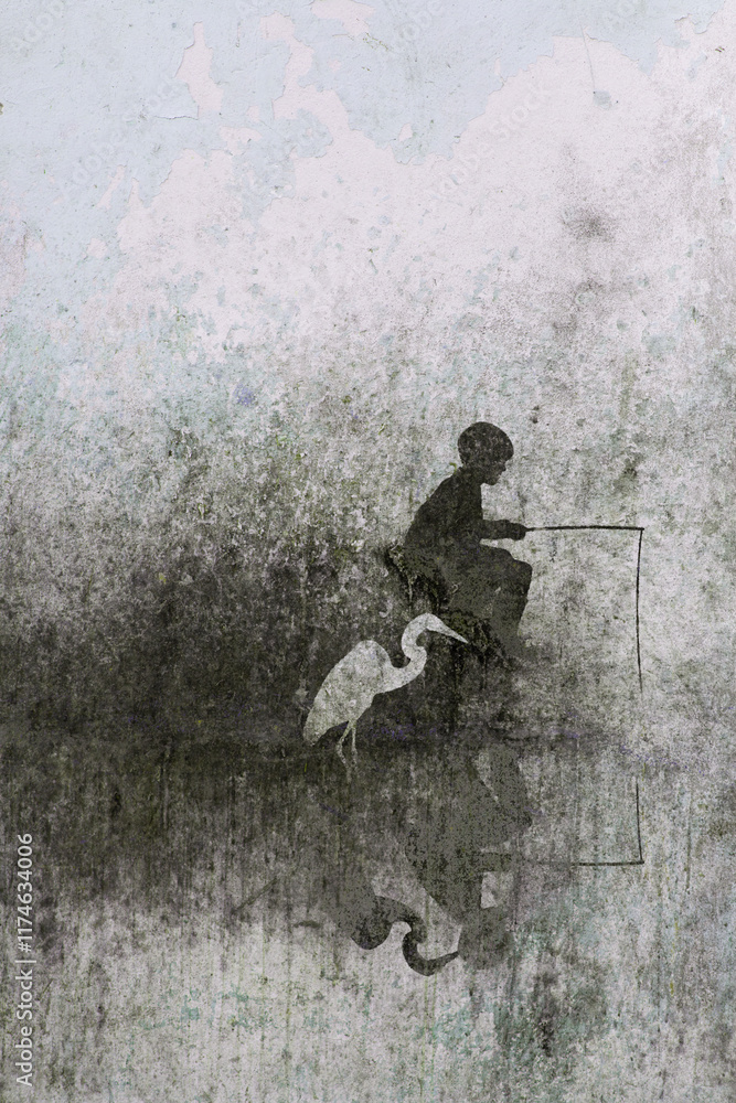 Naklejka premium Boy and heron fishing together