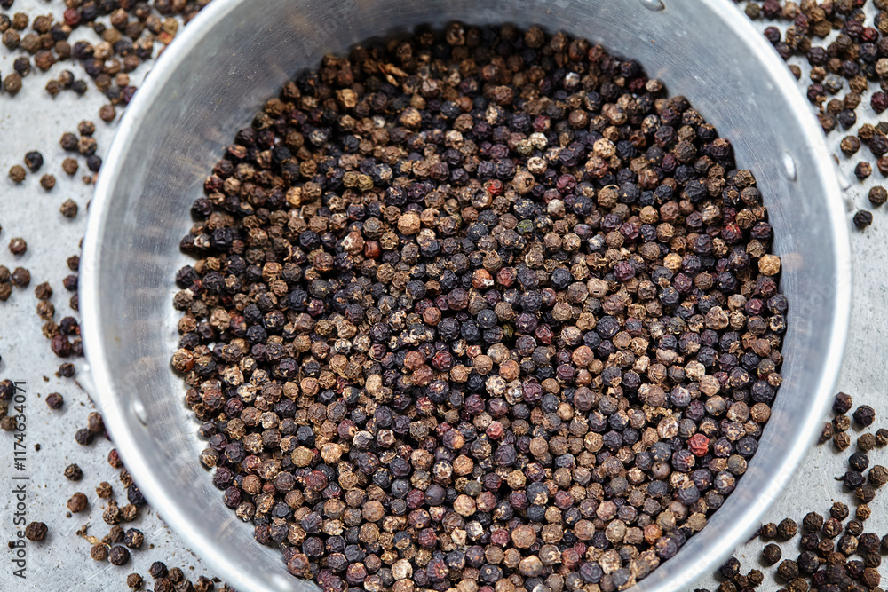 Close-up view of black peppercorns in bowl Close-up view of black peppercorns in bowl