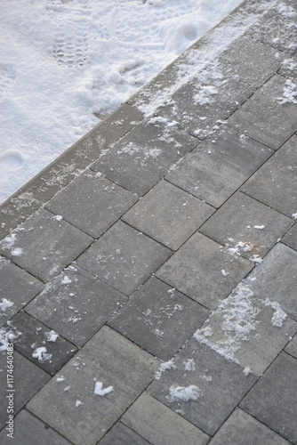 block paving bricks covered in snow photo