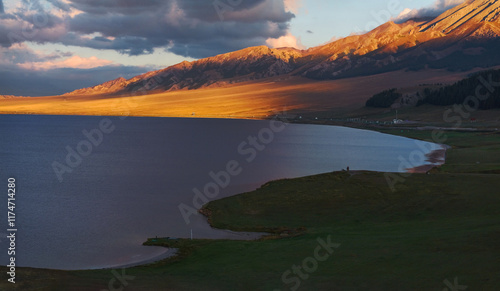 The beautiful scenery of Sayram Lake, coastal mountains, and grasslands in Xinjiang, China on September 4, 2024 photo