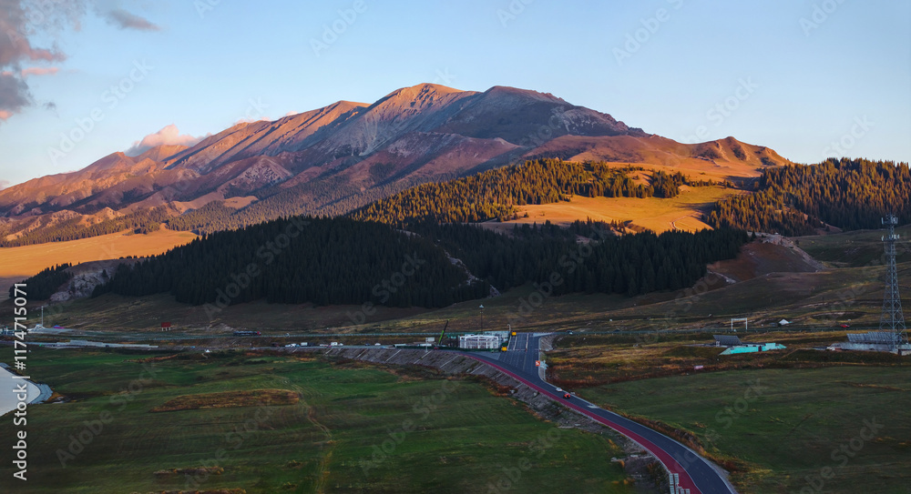 Fototapeta premium The beautiful scenery of Sayram Lake, coastal mountains, and grasslands in Xinjiang, China on September 4, 2024