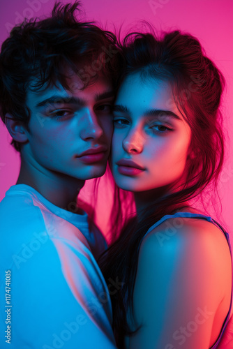 Close-up Face Portrait of Young Couple Hugging and Embracing Under Neon Lights, Fall in Love and Enjoy Their closenesses Together Sharing Emotions,  photo