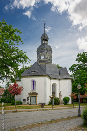 Die denkmalgeschützten Kreuzkirche in Neustadt (Dosse) war der erste barocke Zentralbau der Mark Brandenburg - Ansicht von Westen, Inschriften teilweise retuschiert photo